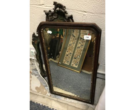 An 18th Century walnut framed wall mirror with gilt gesso slip containing a Vauxhall glass plate, 64 cm x 38.5 cm 