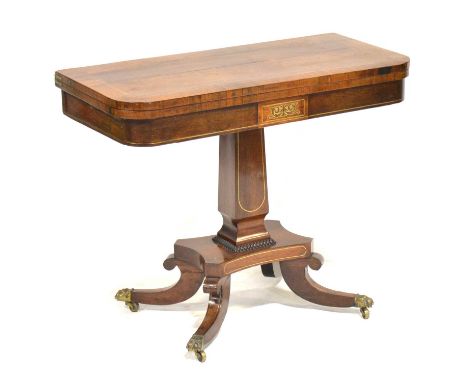 Regency rosewood foldover card table, D shaped top enclosing a baize lined interior, brass inlay throughout, tapering column,
