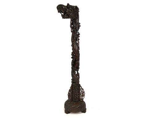 Chinese carved hardwood dragon standard lamp, height 193cm.Condition report:Open joint to the top, throughout some repairs bu