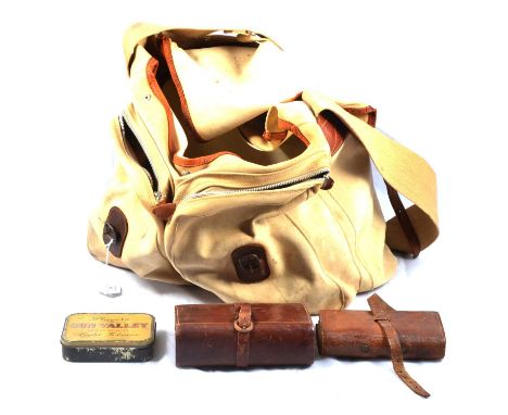 Quantity of assorted fishing tins, tackle, wallets, in a BradySevern fishing game bag, the tin containing fishing weights, ho