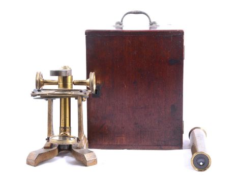 Victorian brass monocular microscope, W Johnson, Optician, Tottenham Court Road, in a mahogany box.
