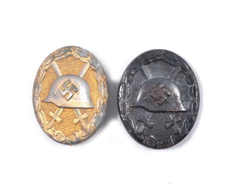 WWII Third Reich German Wound badge, gold, numbered 30 for Hauptmunzampt, Wien, 4.4x3.7cm, and another Wound badge, black, 4.