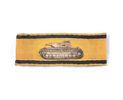 German Tank Destruction badge, gold, with black stripes, silver wash to the tank, cloth back, 9cm.This was awarded to Wermach