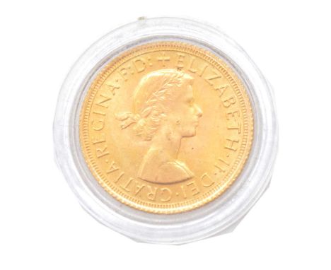 A Gold Full Sovereign Coin, Elizabeth II 1966.Condition report:Is in a plastic case and boxed, certificate says quality is ve