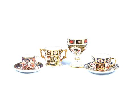 Royal Crown Derby Imari pattern goblet, 12cm; a loving cup; coffee can and saucer; posy bowl; coffee cup and saucer, two tea 