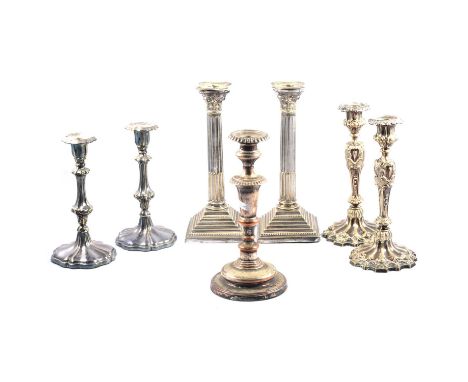 Pair of silver plated candlesticks, Corinthian columns, 31cm, two other pairs of silver plated candlesticks, and an Old Sheff