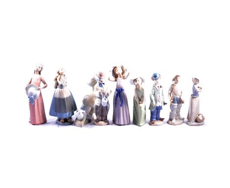 Lladro model of a boy fisherman, 22cm, other Lladro and Spanish figures, some boxed.