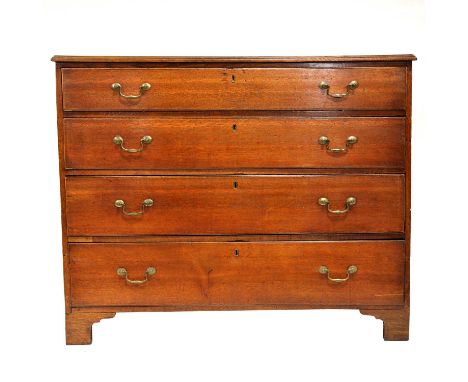 George III oak chest of drawers, the top with moulded edge, four long graduating drawers, bracket feet, width 125cm, depth 56