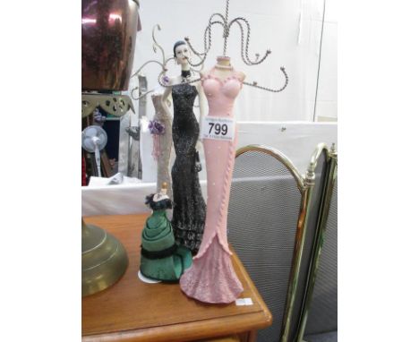 3 jewellery stands in the form of vintage ladies etc.