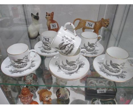 A set 6 piece Royal Worcester cups and saucers featuring birds