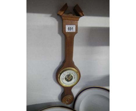 A small mahogany barometer