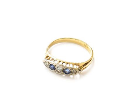 A Sapphire and Diamond Five Stone Ring, three graduated old cut diamonds alternate with two round cut sapphires, in white cla