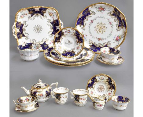 A Coalport Cabaret Set, in cobalt blue Batwing pattern, together with Three Matching Bread and Butter Plates, Three Cups, Sau