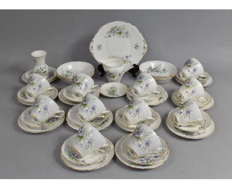 A Regency China Purple Flower Decorated Tea Service to comprise Cups, Saucers, Side Plates, Cups, Bowls Etc 