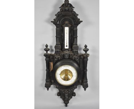 A Large Ebonised French Aneroid Barometer with Thermometer, Carved Case Has Had Woodworm, 100cm high 