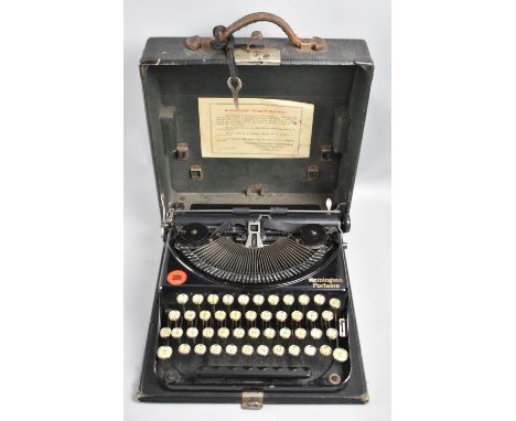 A Vintage Cased Remington Portable Manual Typewriter 