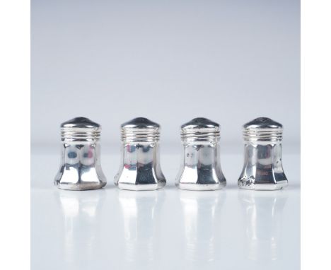 A refined set of four Cartier sterling silver shakers, designed with elegant faceted sides and topped with classic screw-on l