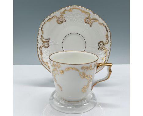 Rosenthal cup and saucer set featuring an elegant gold scroll design. The cup measures 2.5"H, and the saucer measures 5.25" i