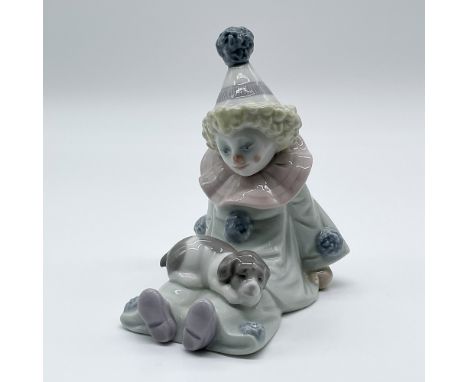 Lladro porcelain figurine titled "Pierrot with Puppy," item number 01005277. Designed by José Puche, this charming piece depi