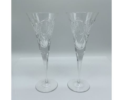 Pair of Waterford Crystal toasting flutes from the Millennium Collection, representing the toast for "Prosperity" in celebrat