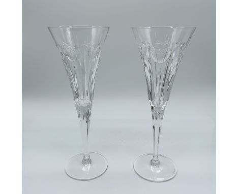 Pair of Waterford Crystal toasting flutes from the Millennium Collection, representing the toast for "Love" in celebration of