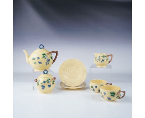 A delightful tea set by Tiffany &amp; Co. in the charming Blackberries pattern. This hand painted set includes a covered teap