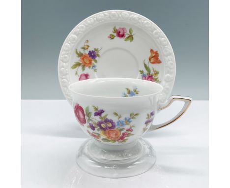 Rosenthal porcelain cup and saucer set in the Maria pattern, featuring vibrant floral motifs with a textured border on the sa