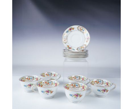 Elegant 12-piece Noritake porcelain cup and saucer set featuring a vibrant floral design accented with intricate gilt details