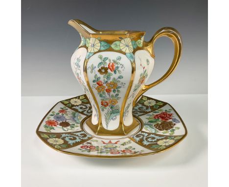 A remarkable pair of hand painted porcelain pieces by Pickard, designed by the renowned artist Emil Tolpin. This set includes