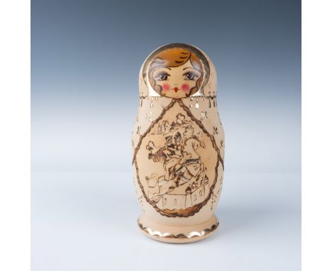 This lot features a complete set of ten (10) Russian nesting dolls (Matryoshka dolls) presented in their original box and acc