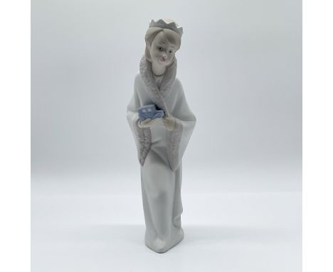 This Lladro porcelain figurine, titled "King Gaspar" (Item Number 01014674), was sculpted by Juan Huerta and first introduced