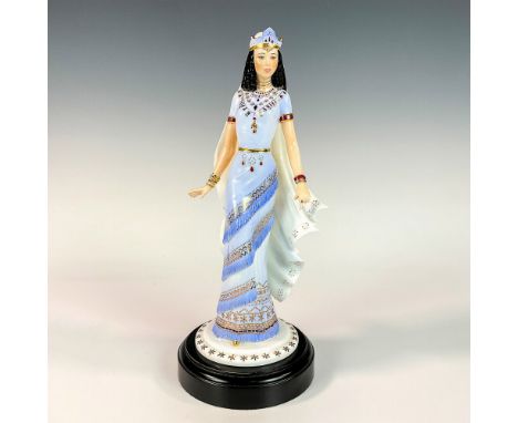 Limited edition figurine modeled as the beautiful Queen of Sheba wearing a tiered cornflower blue dress with gilded gold and 