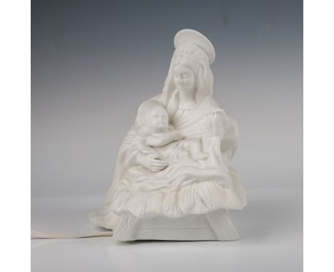 A Gorham porcelain lamp featuring a beautifully detailed sculpture of the Madonna and Child. This lamp doubles as a decorativ