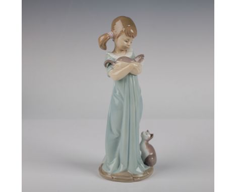 Charming Lladro porcelain figurine titled "Don't Forget Me," model number 5743, designed by Juan Huerta and released in 1991.
