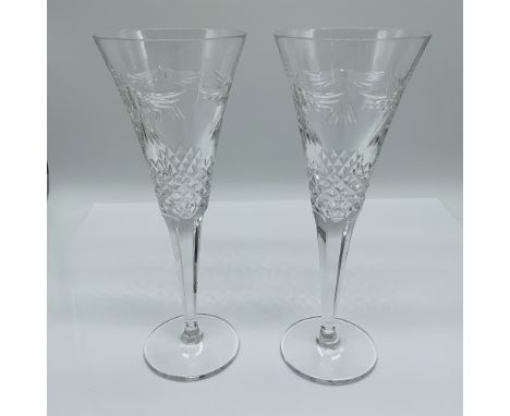 Pair of Waterford Crystal toasting flutes from the Millennium Collection, symbolizing the toast for "Peace" in celebration of
