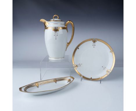 A finely crafted Pickard porcelain serving set featuring lavish gold detailing and elegant Art Deco-inspired designs. This co