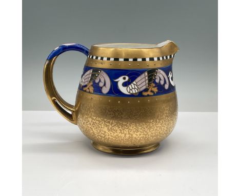 This exquisite Pickard porcelain pitcher features the renowned Bordure Antique pattern, distinguished by a rich cobalt blue b