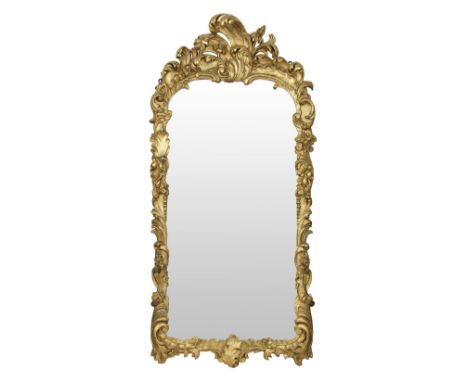 AN ITALIAN CARVED GILTWOOD AND GESSO PIER MIRRORLate 18th centuryThe shaped rectangular plate within a scrolled foliate frame