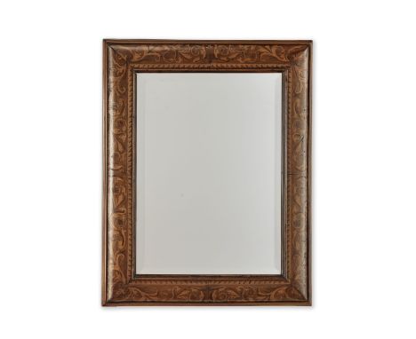 A WALNUT MARQUETRY CUSHION FRAME MIRRORIn the 17th century styleWith a rectangular bevelled plate, 61cm wide x 77cm high (24i