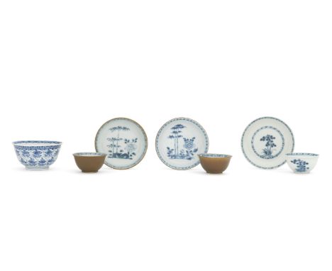 A KANGXI PERIOD BLUE AND WHITE DECORATED LOTUS BOWL18th century Together with three tea bowls and saucers recovered from the 