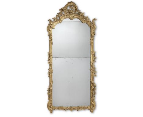 A LOUIS XV GILTWOOD PIER MIRRORMid-18th centuryThe frame carved with flowers, scrolls, oak leaves and acorns,  105cm wide, 22