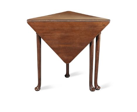 A GEORGE II MAHOGANY CORNER GATE-LEG TABLEWith a drop-down leaf on tapering legs and pad feet, 81cm wide x 40.5cm deep x 70cm