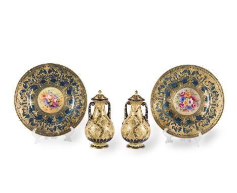 A PAIR OF ROYAL WORCESTER CABINET PLATESThe blue border with a nouveau style decoration, the centre with floral sprays by St.