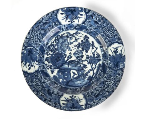 A CHINESE BLUE AND WHITE DISHKangxi, 17th-18th centuryThe base with double circle and auspicious and floral symbol, 38.5cm (1