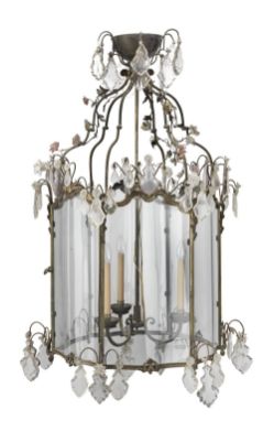 A LARGE FRENCH GILT-BRASS AND CUT-GLASS THREE-LIGHT HEXAGONAL HALL LANTERNLate 19th centuryThe top entwined with tendrils mou