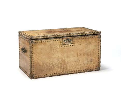 A 19TH CENTURY LEATHER STUDDED TRUNKThe hinged top with brass stud to the edge with walnut veneer and stellar inlay to unders