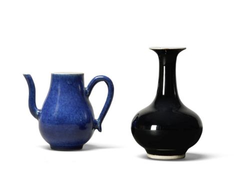 A KANGXI PERIOD BLACK MIRROR GLAZE VASE18th century Together with a Kangxi period powder blue teapot, 8cm wide, 8cm deep, 12.