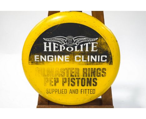 A printed metal Hepolite Engine Clinc advertising sign, 61cm diameter
