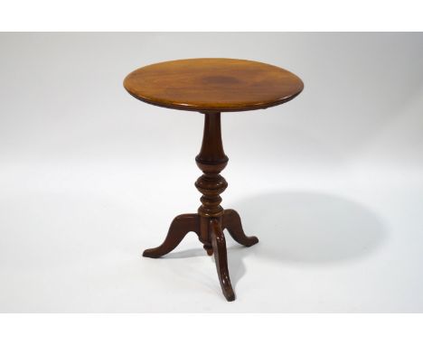 A mahogany tilt top tripod table, 74cm high x 64cm diameter