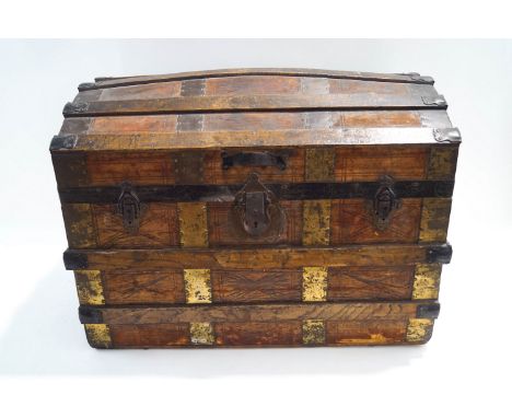 A 19th century metal bound travelling trunk, with interior shelf, 53cm high x 72cm wide x 44cm deep